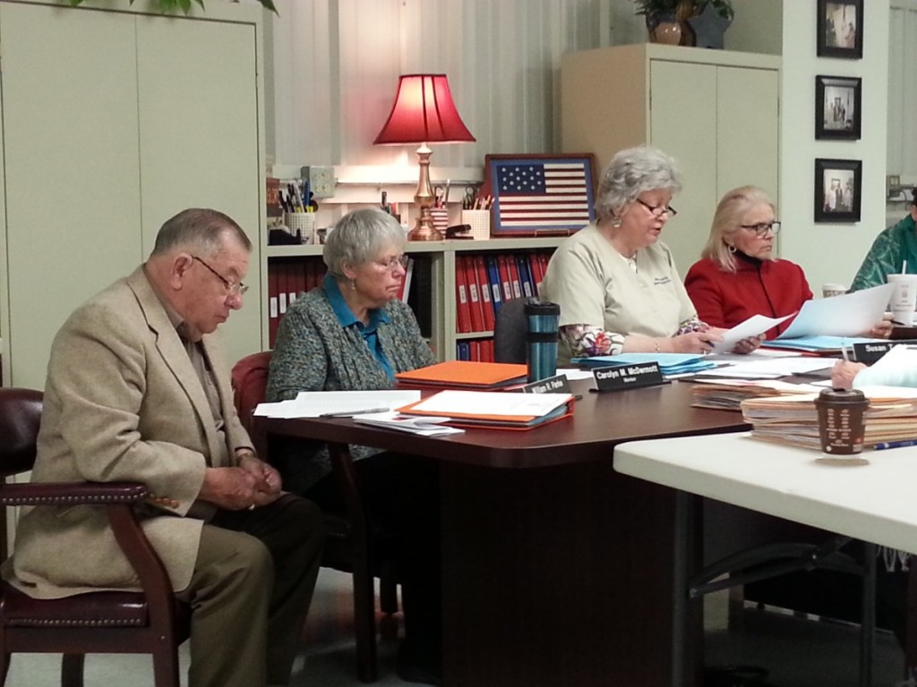 Moore County BOE members (L-R), Bill Parke, Carolyn McDermott, Susan Adams at the Feb 10 hearing.